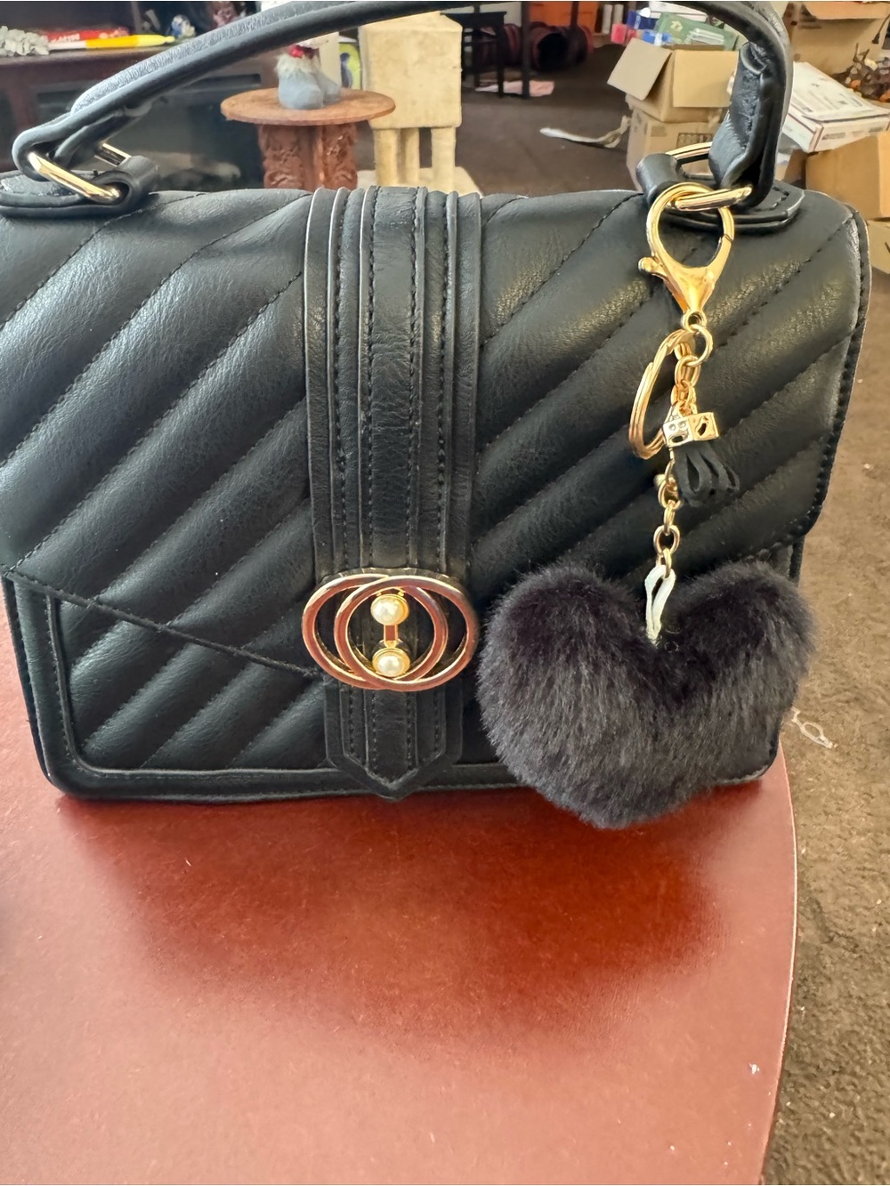 Aldo Black Quilted Top-Handle Handbag with Gold Hardware and Fur Heart Charm